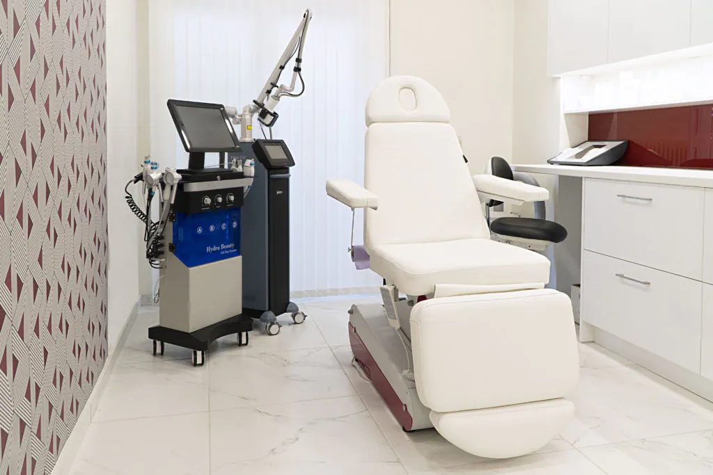 The treatment room with the laser and Hydrafacial equipment